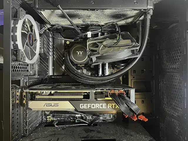 Computer fan clogged with dust causing overheating